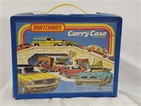 Vintage Matchbox carry case with various toy cars