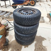 4 - 185/60R14 Winter Tires on Rims 70% Tread