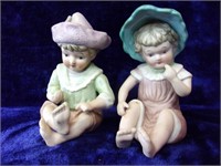 Bisque Boy and Girl Figurines
