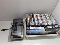 Assorted DVDs & VHS Tapes & VHS Rewinder