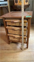 Three wicker drawer basket cabinet