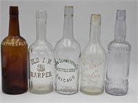 Five Old Embossed Bottles