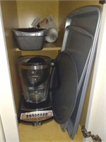 Items in cabinets and around kitchen stove