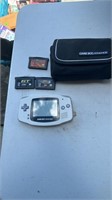 Game boy advanced with 3 games and a case