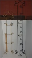 one black, one golden wall plate hangers
