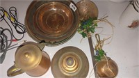 assorted copper/brass decor items