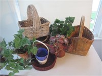 Artificial plants and wicker baskets.