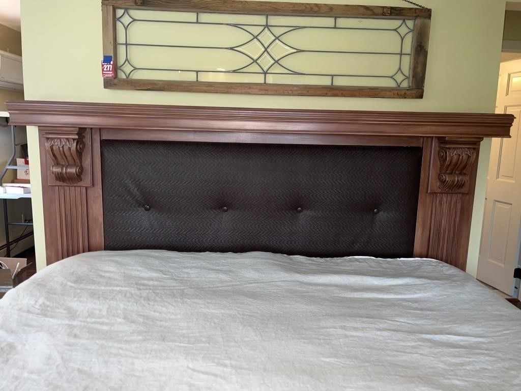 Carved poplar headboard with woven fabric inlay