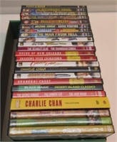 (23) DVDS IN CASES CHARLIE CHAN & WESTERNS.