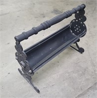 Vintage cast iron newspaper log roller