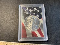 1986 Walking Liberty silver round, slabbed in a