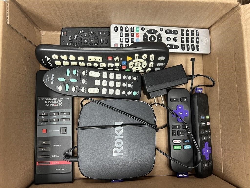 ROKU UNIT WITH REMOTE AND MISC REMOTES