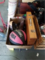 Box of  Bike seats and basketball