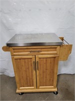 Kitchen island on wheels with stainless steel top