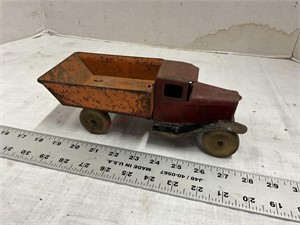 Tin truck with wooden wheels
