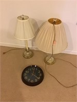 Two lamps and a clock