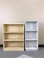 A pair of old wooden bookcases