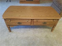 Oak coffee table with laminate top & two drawers