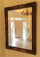Ornately Framed Beveled Wall Mirror