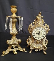Brass clock and candle holder