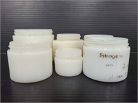 Collection of milk glass cosmetic jars