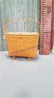 Longaberger footed basket with handle