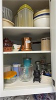 Measuring cups and contents of cabinet