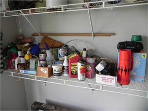 Shelf full of Misc. Liquids, Paint, Fan, Thermos,