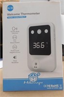 Wall mounted forehead thermometer