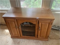 Oak cabinet with side storage. See all pics