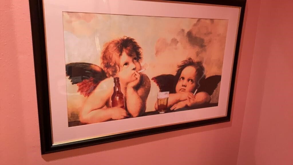 Smoking angels framed print