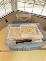 Large tote with lid filled with quilting supplies