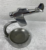 Nickle Plated Military Fighter Plane Over Ashtray