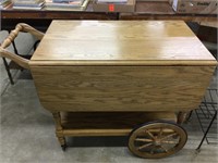 Rolling cart.  29” tall x 39” long x 19” deep