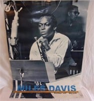 Large Miles Davis poster.