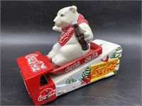 Coca-Cola: Mechanical Bear Sliding  Down Hill
