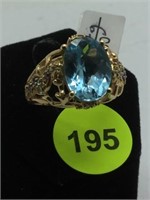 14K YELLOW GOLD RING WITH BLUE TOPAZ CENTER STONE