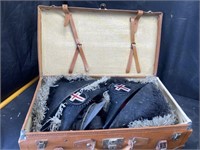 Masonic suitcase full of Masonic hats