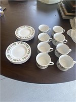 Set of eight Christmas cups and saucers