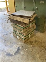 Approximately four boxes floor tile see photo