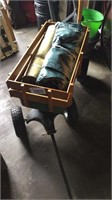 Robert tired child's wagon with wooden sides,