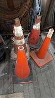 Lot of orange safety, cones, different sizes and