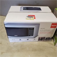 Unused 0.7cu ft Stainless Microwave