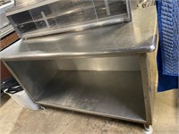 Stainless steel cabinet with large lower opening