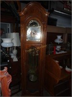 Howard Miller Lunar Phase Grandfather Clock In Oak