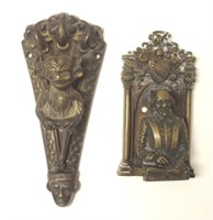 Two antique figural brass door knockers