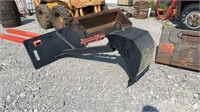 Heavy duty skid steer back hoe attachment