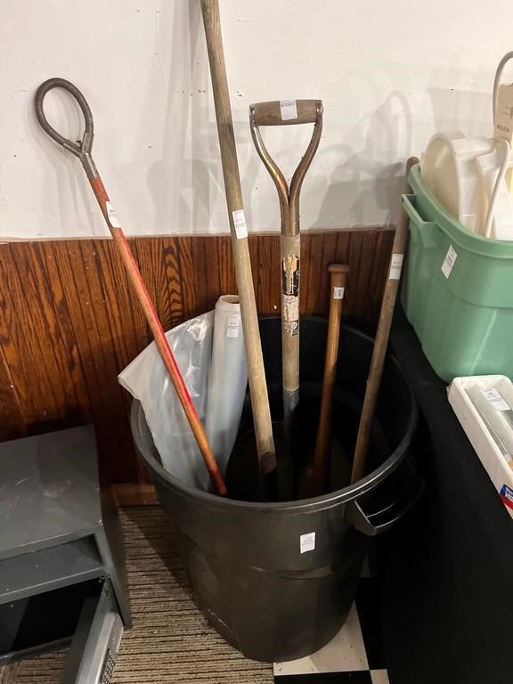 Yard Tools in Garbage Can