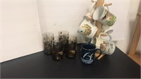 4 butterfly glasses, and 7 mugs