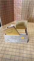 Wooden box with old books